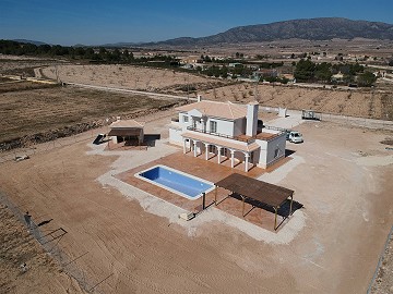 New build villa with a plot and pool
