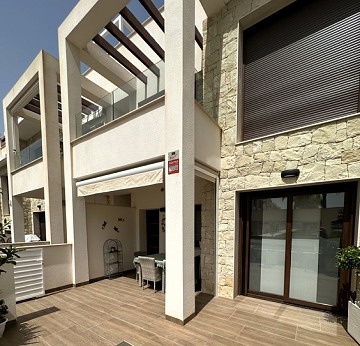 Stunning Ground Floor Bungalow With Communal Swimming Pool